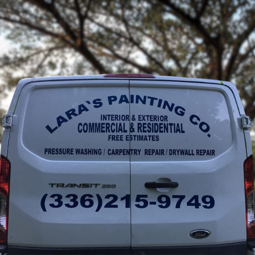 White van with signs made by us